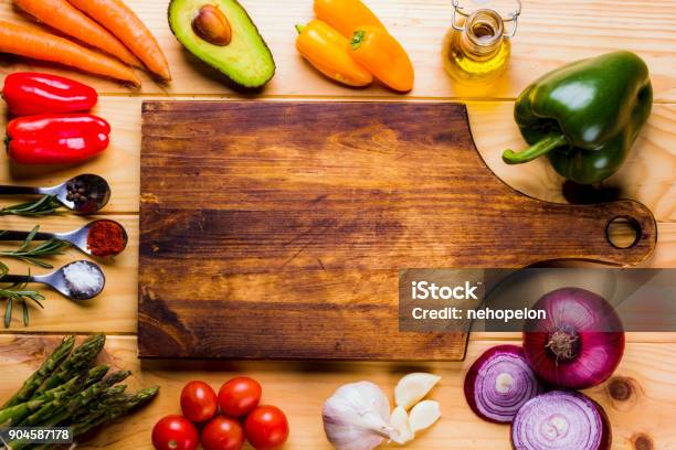 Cutting Board With Fresh Ingredients For Cooking Stock Photo - Download Image Now - Food, Cutting Board, Cooking