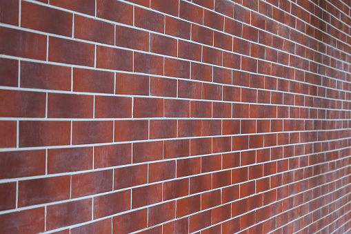 Perspective view of a brick wall as a background or a backdrop