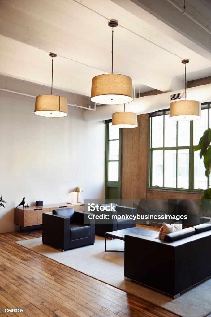 Empty lounge area in luxury business premises, vertical Lobby Stock Photo