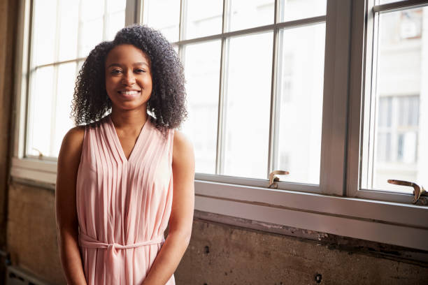 istock Smart young black businesswoman smiling to camera 904595376