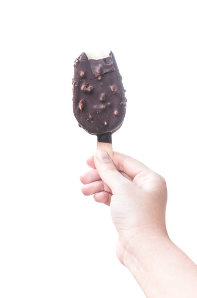 istock Woman hand holding  icecream  isolate on white 904598370