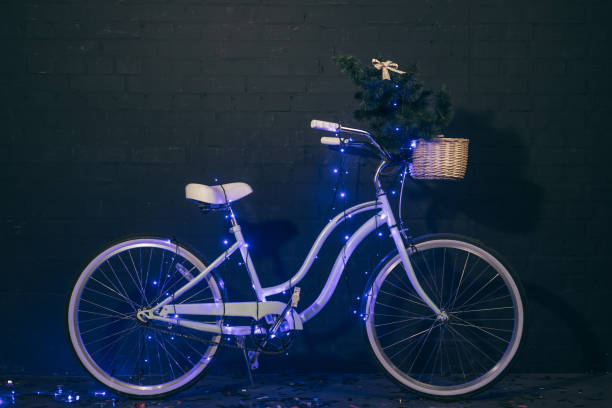 istock retro bicycle in christmas lights 904599480