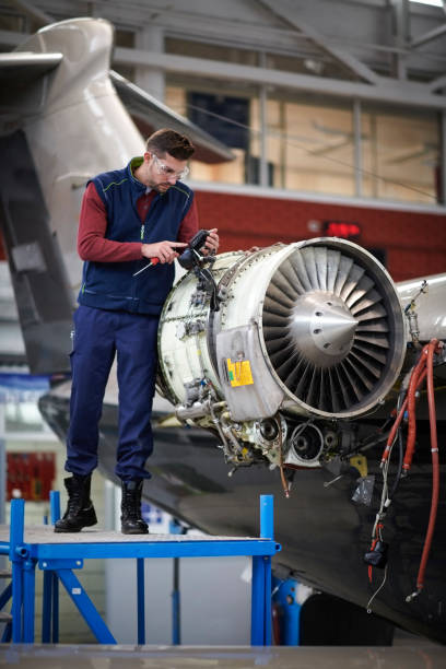 istock Aircraft mechanic in the hangar 904599726