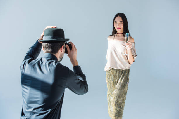istock man taking picture of asian girlfriend 904602412