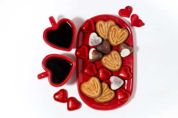 istock plate with cookies and candies for St. Valentines Day, coffee 904602900