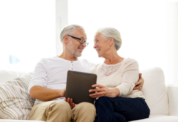 istock happy senior couple with tablet pc at home 904603956