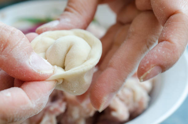 istock The process of making delicious home-made dumplings with meat. 904604074