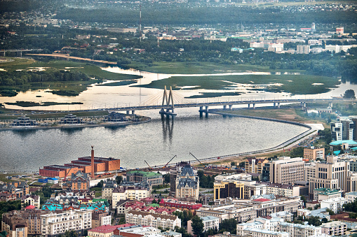 Helicopter point of view of Kazan, capital of Republic of Tatarstan, Russia. Millennium bridge is seen in the image.
