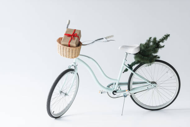 istock retro bicycle with christmas tree and gift 904608446