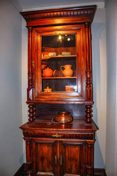 istock Vintage wooden cupboard in the room 904612296