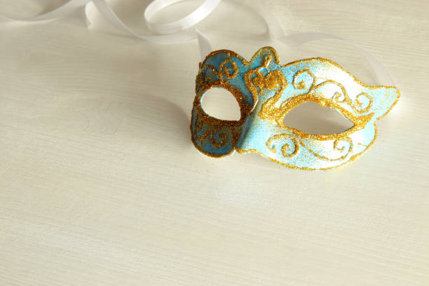 istock Image of delicate blue elegant venetian mask white background. 904616682