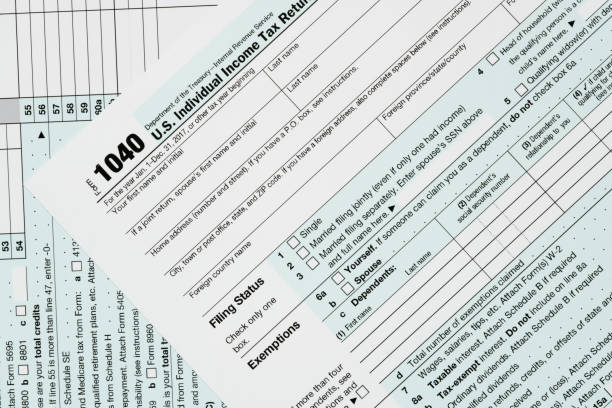 istock Macro close up of 2017 IRS form 1040 904621008