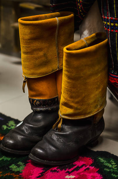 istock Traditional ukrainian costume, retro ethnic leather boots 904638004