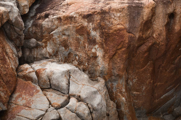 istock Rock on the beach - stone texture close-up 904639524