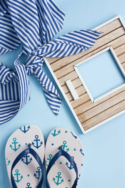 istock Beach items with accessories  on wooden background 904639530