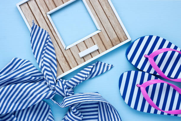 istock Beach items with accessories  on wooden background 904639546