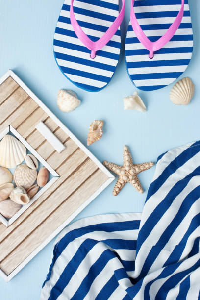 istock Beach items with accessories  on wooden background 904639670