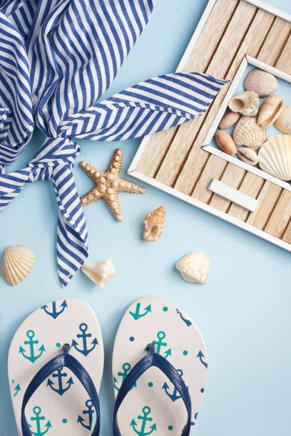 istock Beach items with accessories  on wooden background 904639700