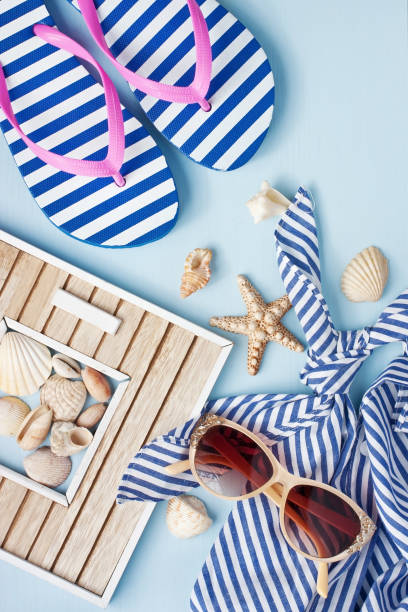 istock Beach items with  sunglasses  on wooden background 904639728