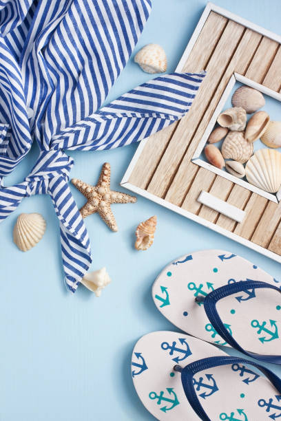istock Beach items with accessories  on wooden background 904639752