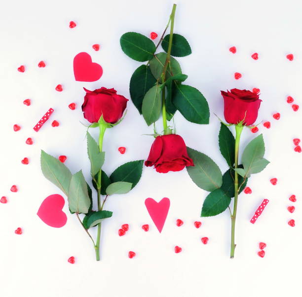 istock Valentine's day. red roses composition on a white background.top view.flat lay 904642544