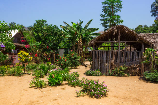 Little huts in a village on Nosy Komba Island, Nosy Komba, Madagascar stock photo