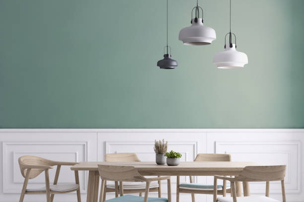 Dining room wall background template Dining room apartment interior with wooden chairs and table, green plan decoration. Concrete polished floor, and classical decoration on the wall. Gray wall copy space template mock up. showcase interior dining room home decorating home interior stock pictures, royalty-free photos & images