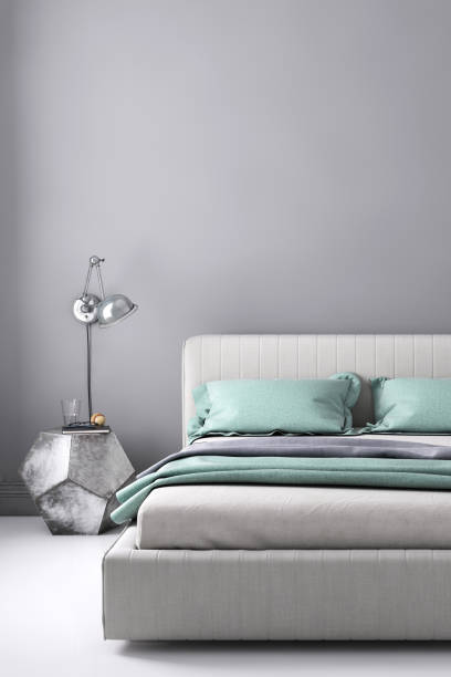 istock Bed with nightstand and wall lamp template 904651338