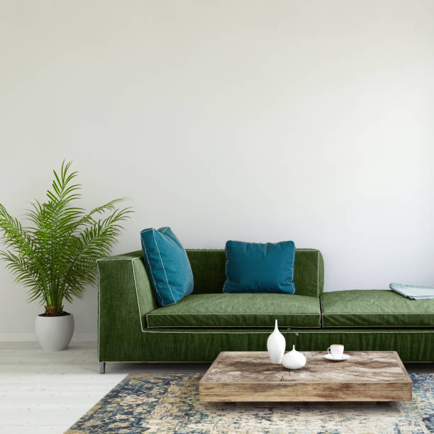 sofá color pastel con plantilla de pared en blanco - cushion sofa pillow indoors fotografías e imágenes de stock