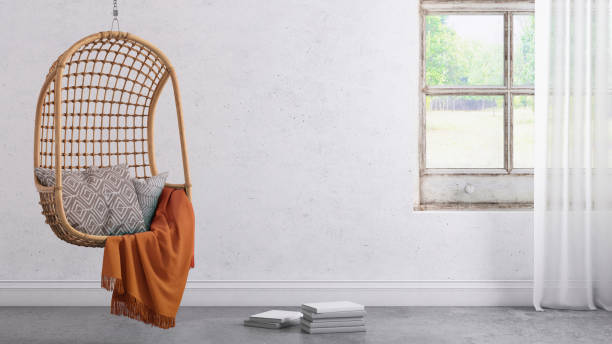 istock Modern hipster interior with pendant chair window and curtains with copy space wall 904651394