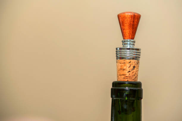 istock Wine stopper on wooden background close 904654716