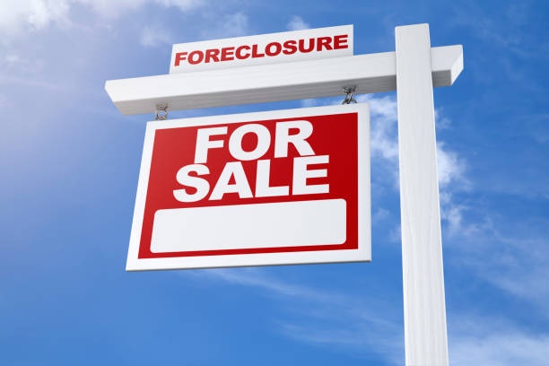 istock Real Estate Sign For Sale Foreclosure Blue Sky 904661306