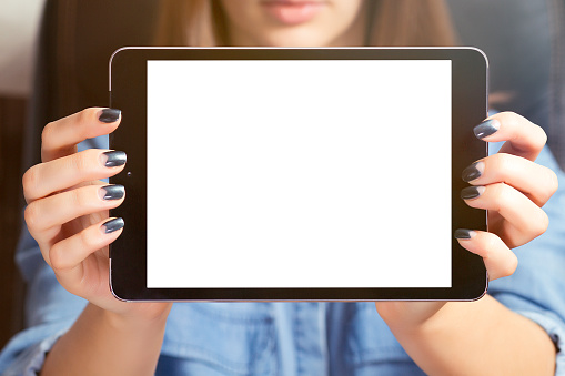 Woman hands using digital tablet. Using for mockup.