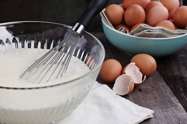 istock Bowl of Pancake Batter with Egg Whisk 904669138
