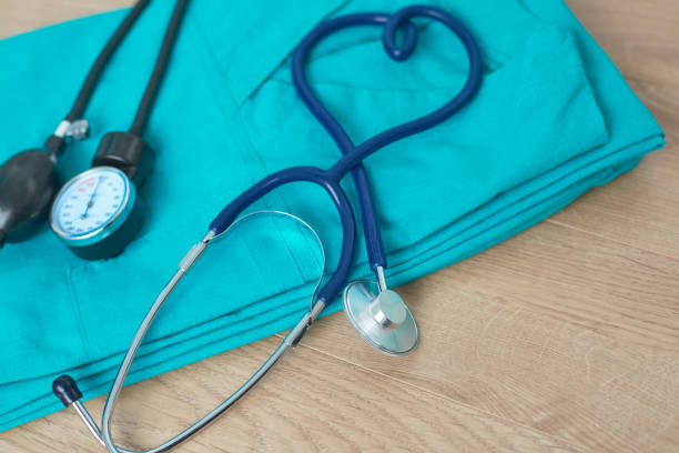 istock Medical devices stethoscope, tonometer on medical uniform 904670096