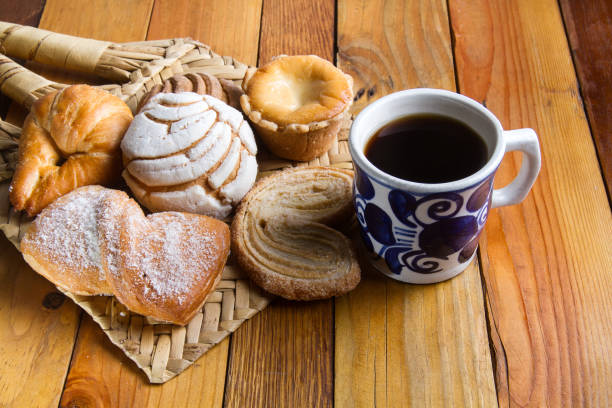 istock Mexican sweet bread and cup of black coffee 904687214