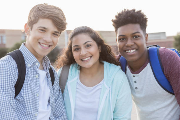 istock Three High School friend smile for the camera 904694864
