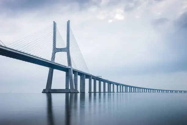 Vasco da Gama Bridge at sunrise in Lisbon, Portugal