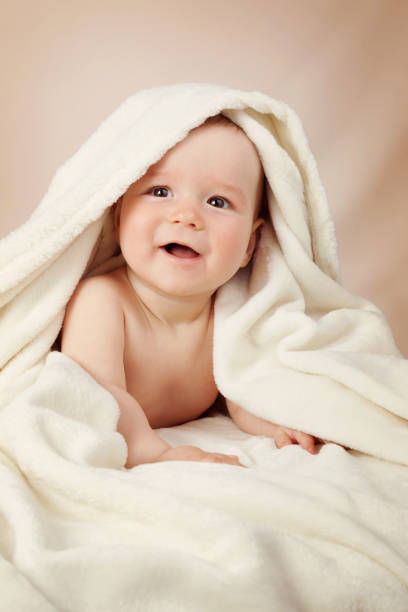 istock Cute baby in a towel 904698774