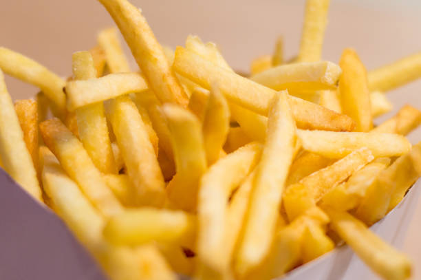 istock French fries or chips in the box. 904706602