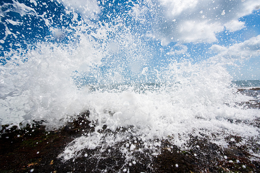 Close up of wave at tropical sunny day.