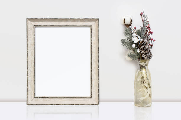 istock Wooden frame and winter decorations. White clear Mock-up for art work presentations 904715440