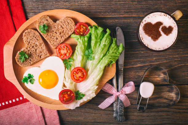 istock Breakfast on Valentine's Day on rustic wooden table. 904720500