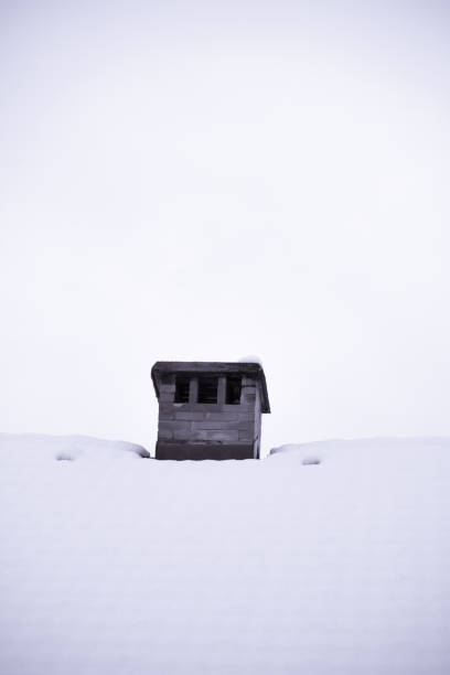 istock close up on red bricked chimney on snowy rooftop isolated 904723952