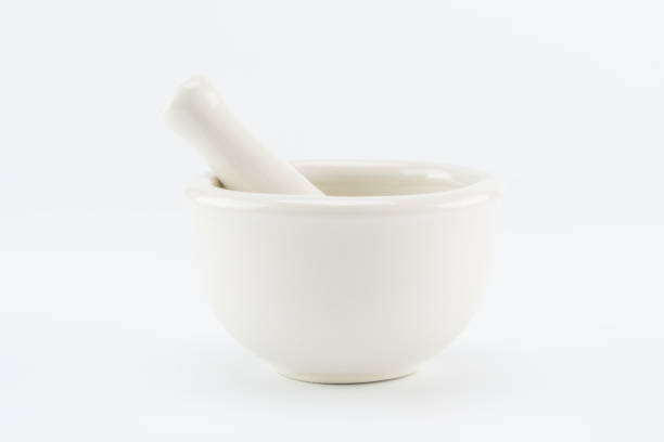 istock mortar and pestle on white background 904727250