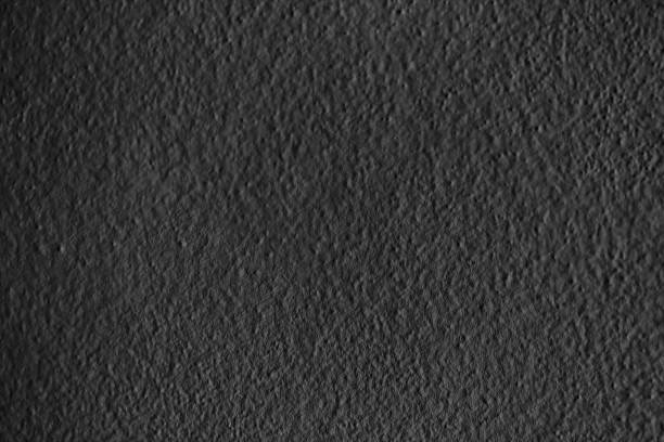 istock Monochrome Texture of plaster on the wall, cracked background, stone surfac 904740128