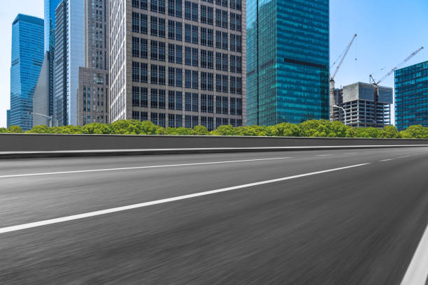 istock Clean asphalt road with shanghai city skyline background 904753884