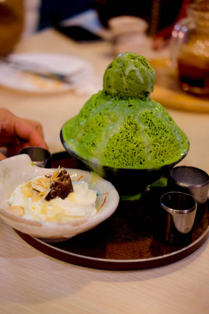 istock Green Tea Bingsu (Korean ice dessert) with green tea ice cream served on Tray 904770216