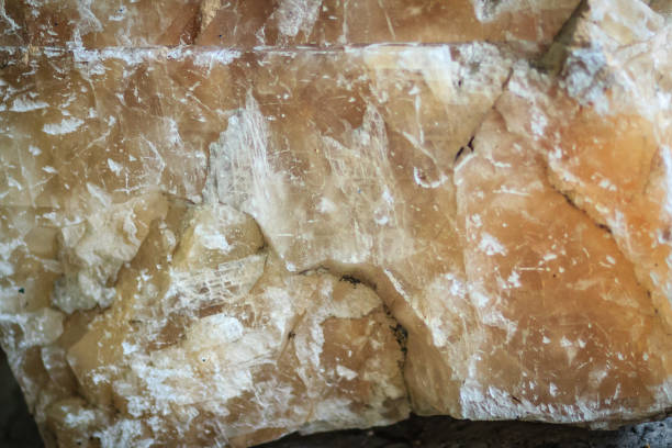 istock Calcite ore in the limestone quarry from mining and quarrying industries. Calcite is a carbonate mineral and the most stable polymorph of calcium carbonate (CaCO3). 904773116