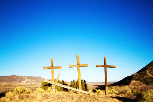 istock Abiquiu, NM: Three Large Wooden Crosses, Vibrant Blue Sky 904776460